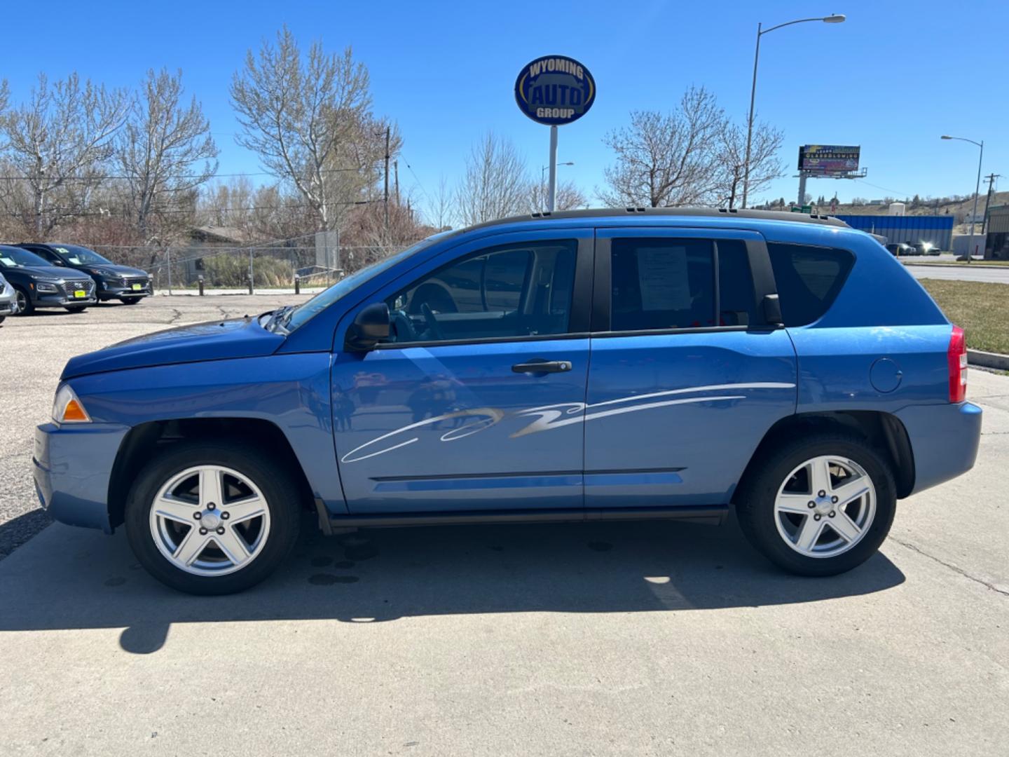 2007 /Gray JEEP COMPASS SPORT (1J8FF47W17D) with an 2.4L engine, 5-Speed Manual transmission, located at 3030 CY Ave, Casper, WY, 82604, (307) 265-3830, 42.827816, -106.357483 - Photo#0